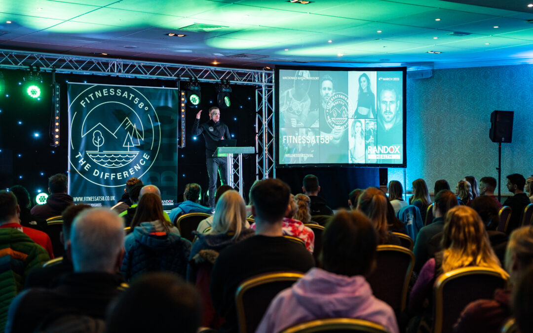 Sam Cairns, Fitnessat58 Founder, opening Wellness Festival to attendees