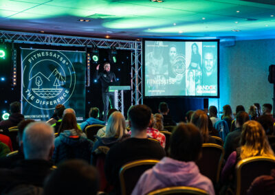 Sam Cairns, Fitnessat58 Founder, opening Wellness Festival to attendees